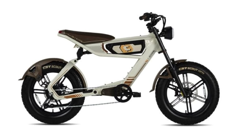 Side view of a white and brown electric bike with CST Scout tires, a padded seat, and an integrated headlight.