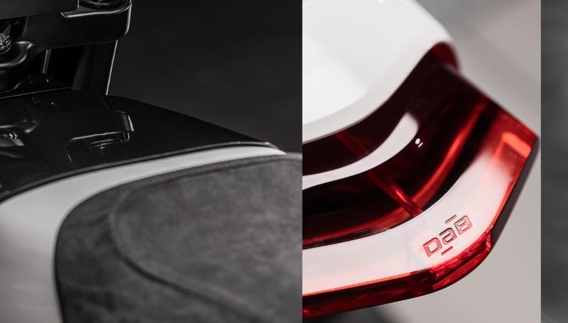 Close-up diptych of a boutique electric motorcycle, focusing on textured seat details on the left and a red taillight with the logo 