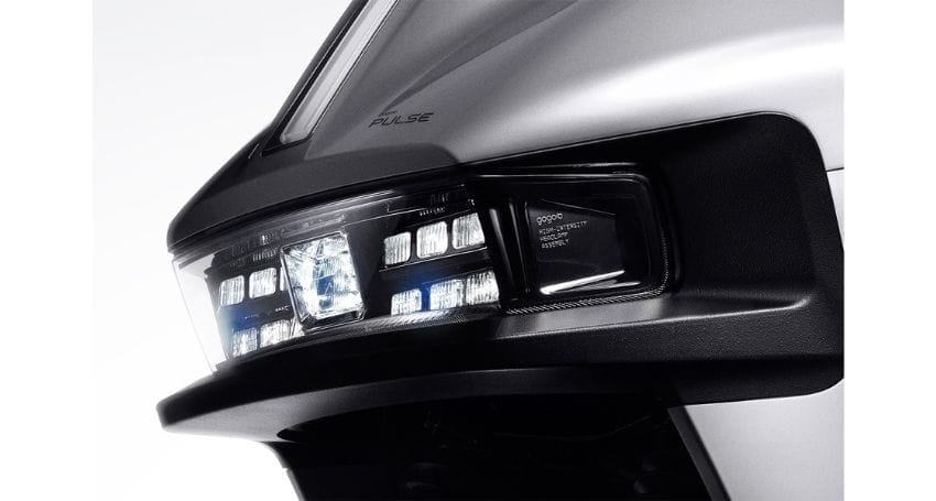 A close up of the headlights of a Gogoro truck.