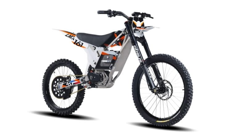 A white and orange electric dirt bike with black tires and a black seat, viewed from the side on a white background.