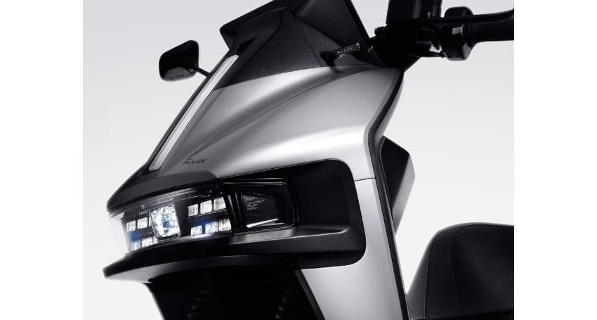 A close up of the front end of a Smartscooter Pulse motorcycle.