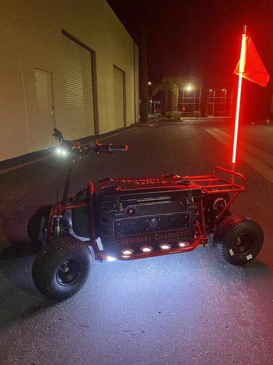 Red go kart with a red light.