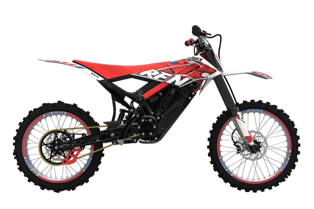 A red, white, and black off-road dirt bike with knobby tires, front and rear suspension, and a chain drive on a white background.