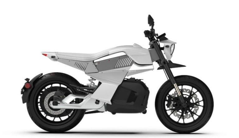 A white electric motorcycle with a sleek, modern design and black wheels is shown in a side view.