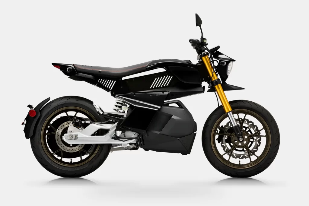 A black and gold motorcycle is shown against a white background.