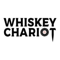 Logo for Whiskey Chariot featuring bold black text, with the letter "O" replaced by a wheel with a circular design.