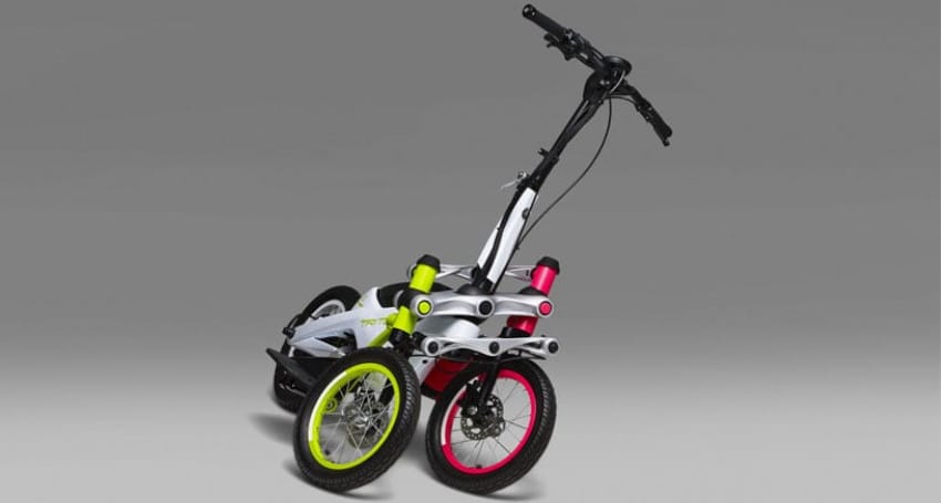 A white and black foldable electric tricycle with two front wheels, one yellow and one red, and a single rear wheel.