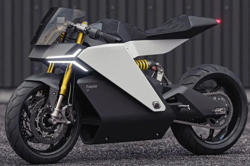 A black and white motorcycle is parked in front of a building.