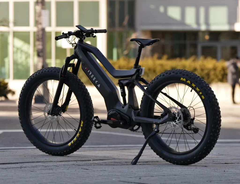 a bicycle parked on the side of a building