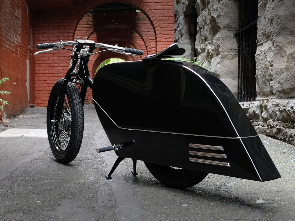 Black motorcycle, alleyway