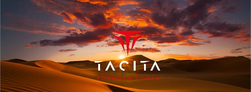 The logo for tacita is shown on a sand dune.